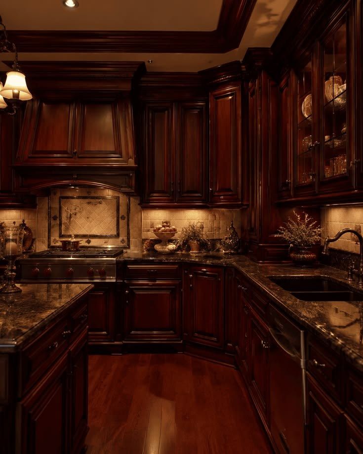 A dark wood kitchen with glass-front uppers, a stone counter, and a tiled backsplash.